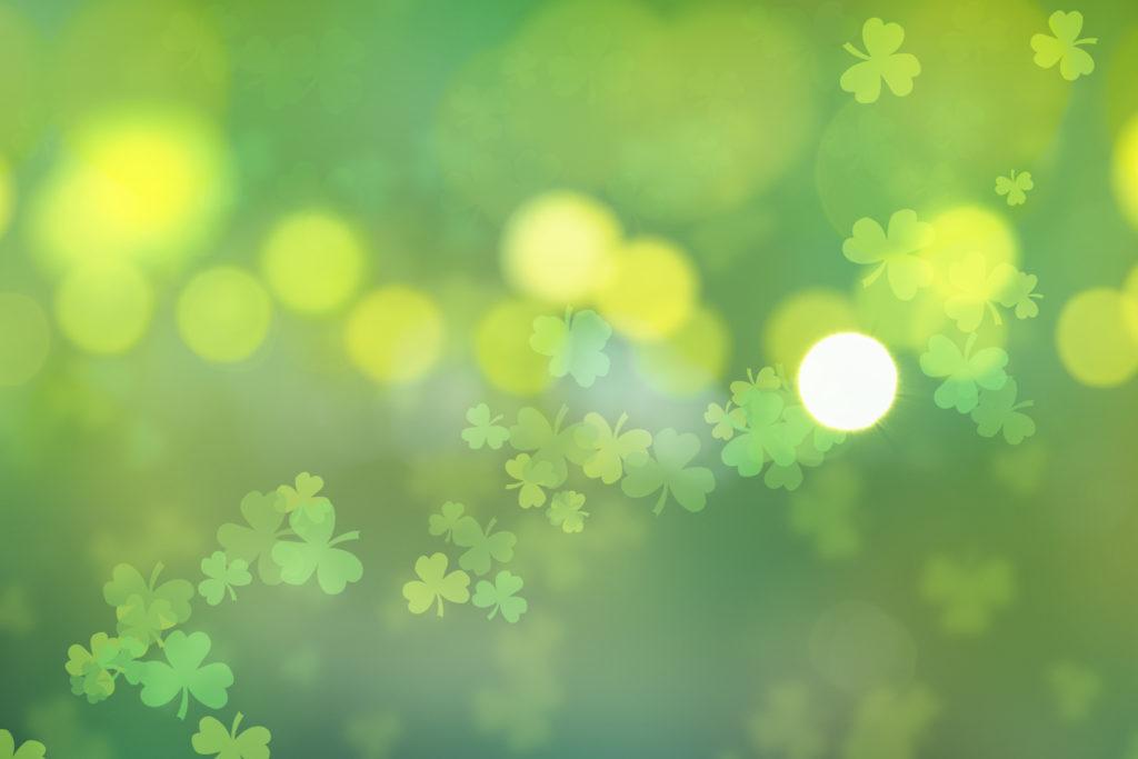green St. Patrick's day background with clovers
