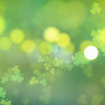 green St. Patrick's day background with clovers